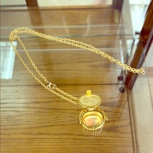 A vintage lighthouse basket necklace